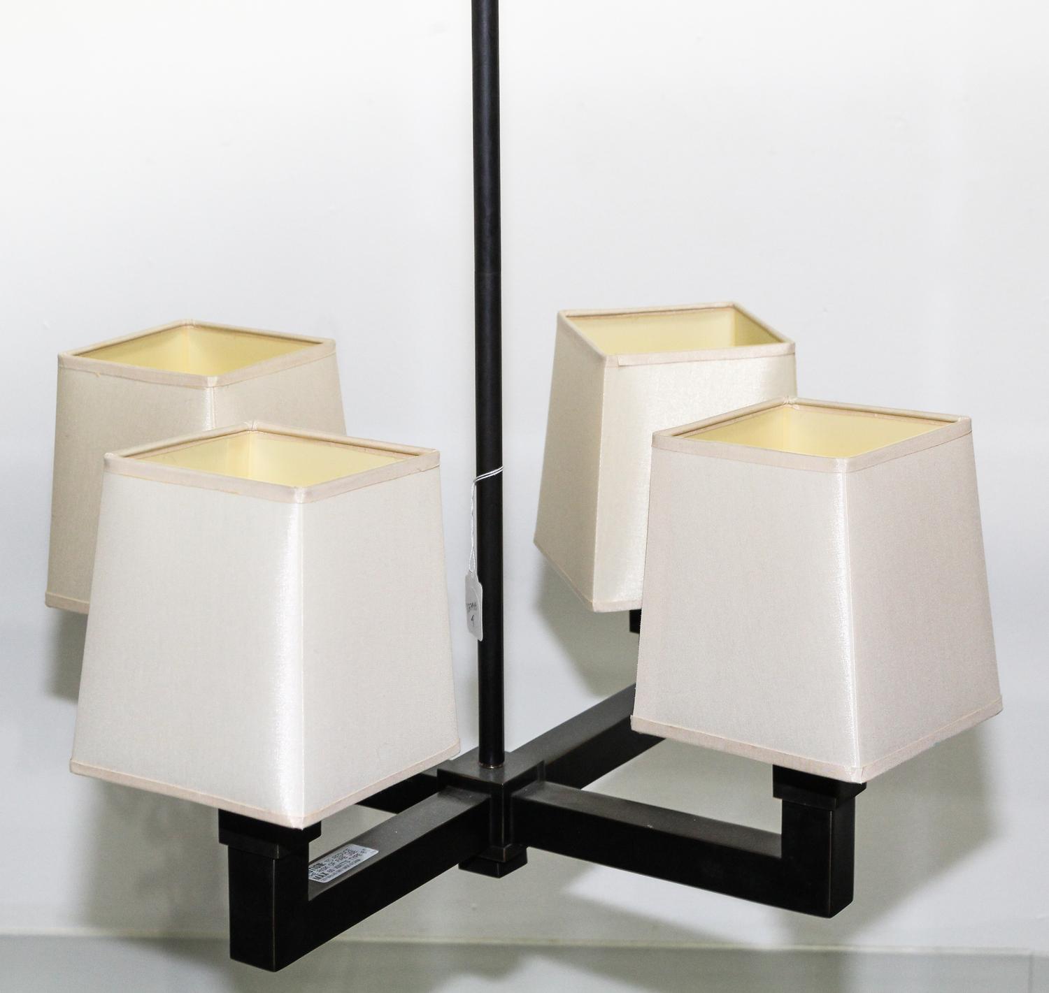 A Holly Hunt Four Light Chandelier Diameter of base 19 inches overall. — 20TH CENTURY