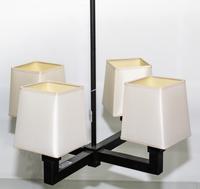 A Holly Hunt Four Light Chandelier Diameter of base 19 inches overall. — 20TH CENTURY