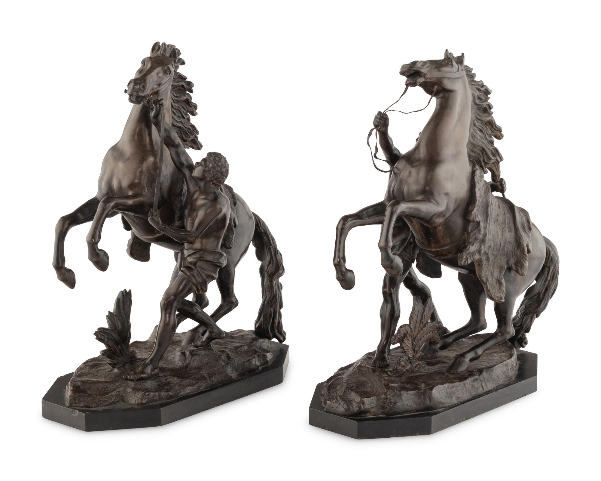 A Pair of French Bronze Models of Marly Horses