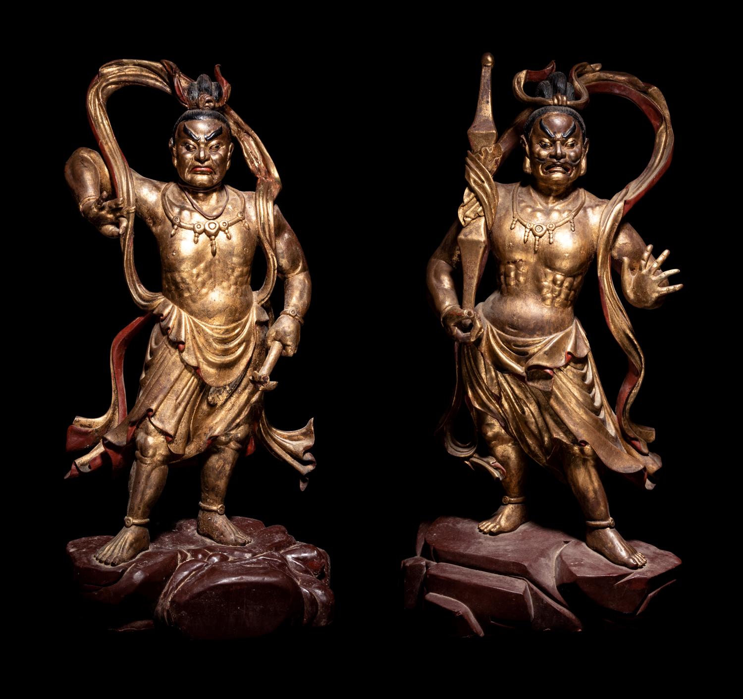 A Pair of Gilt and Red Lacquered Wood Figures of Guardians