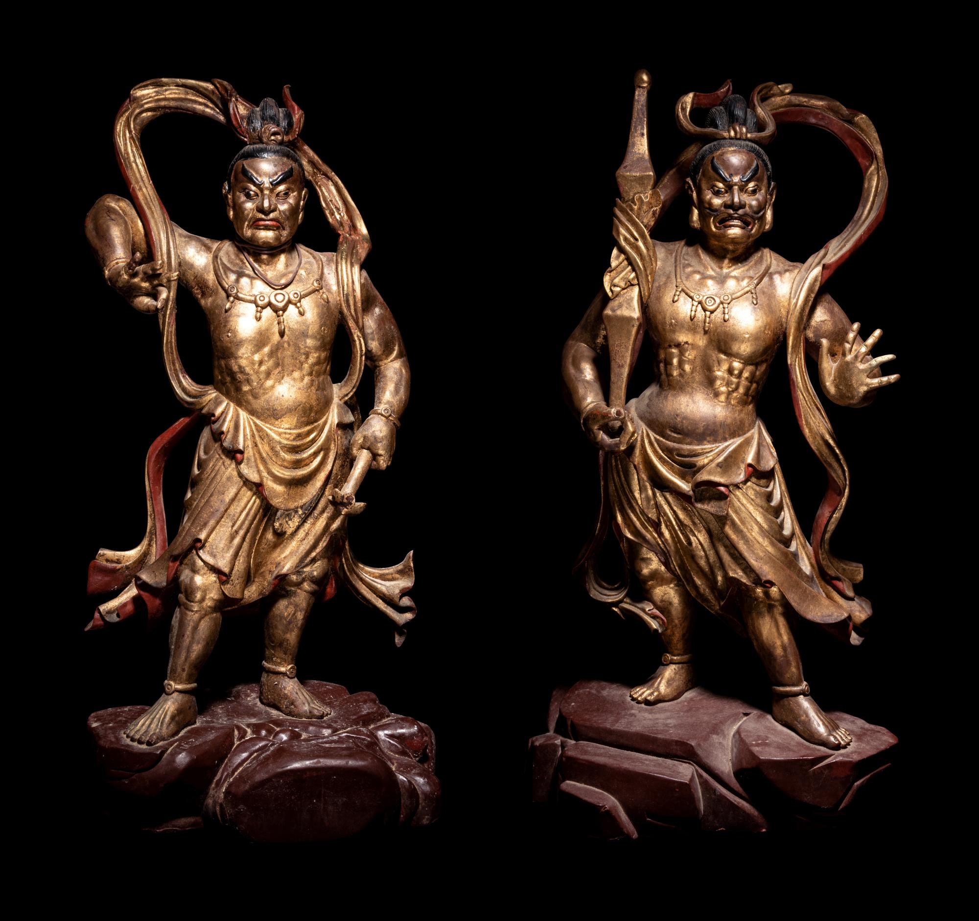 A Pair of Gilt and Red Lacquered Wood Figures of Guardians