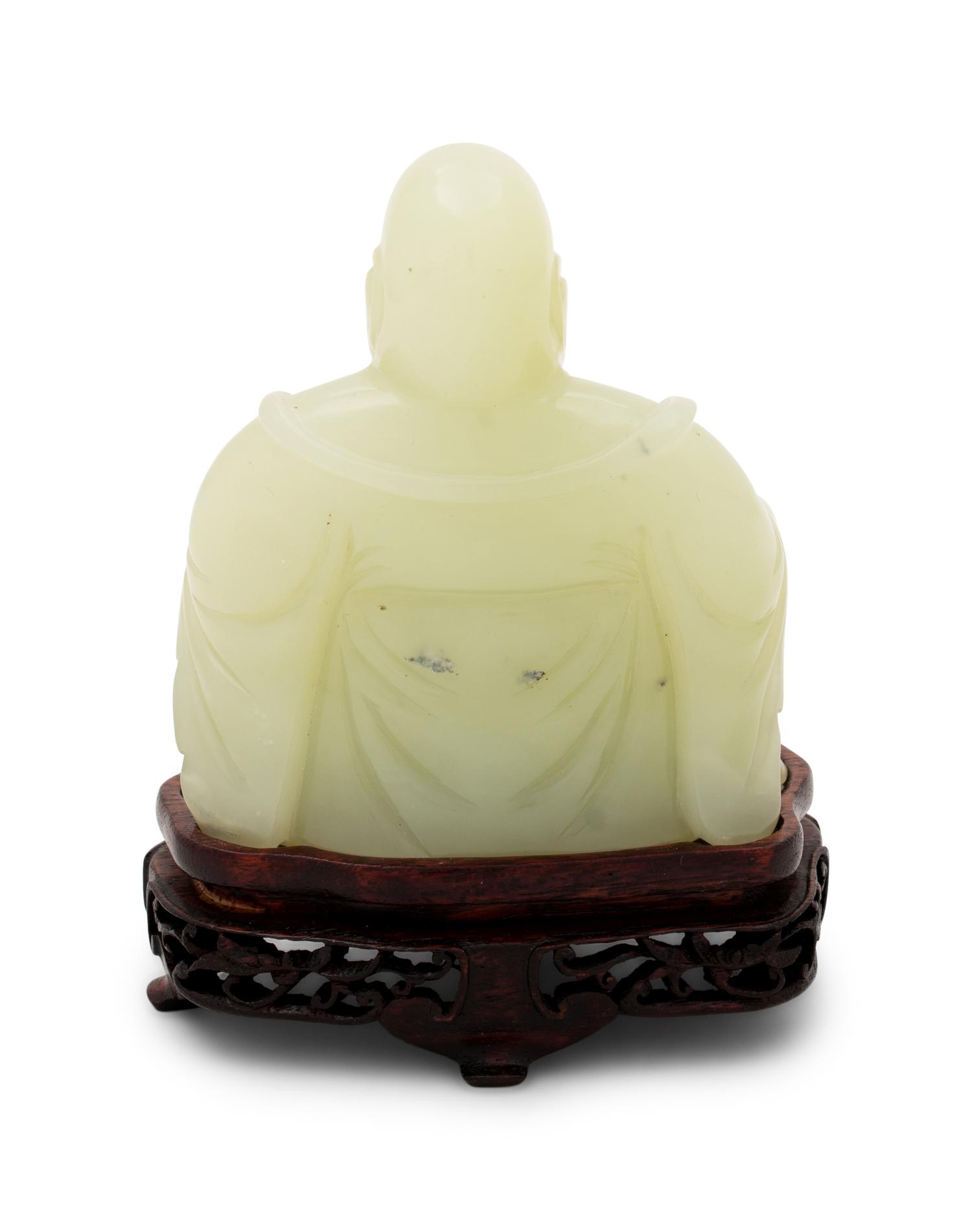 A Chinese Serpentine Figure of a Laughing Buddha