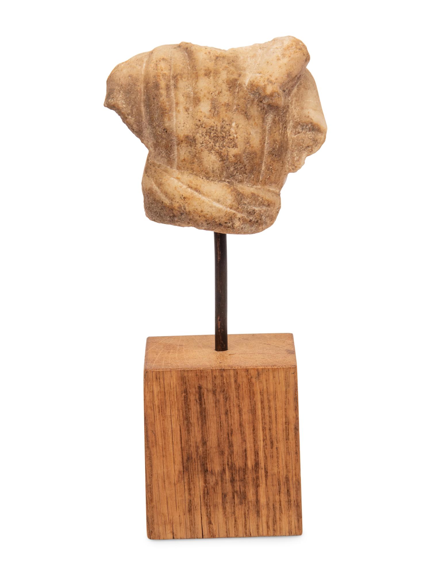 A Roman Marble Torso of Artemis