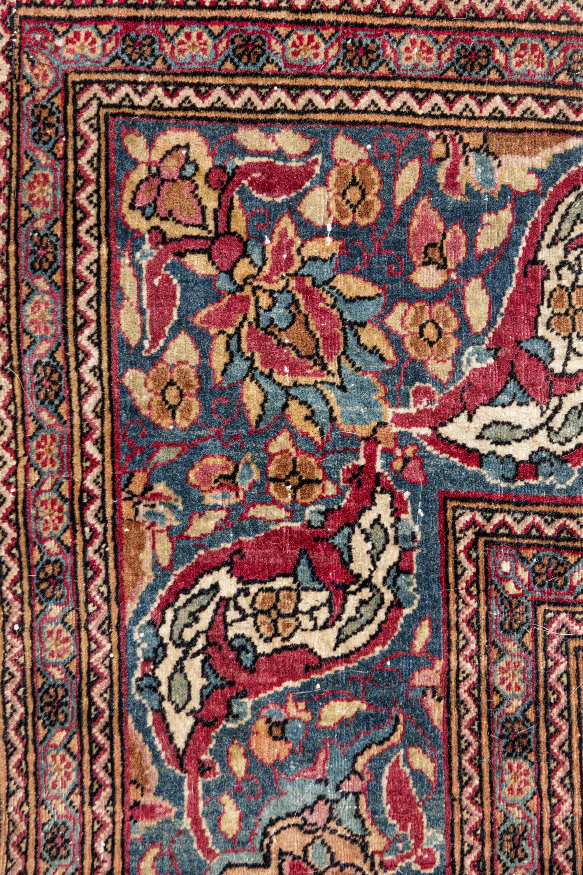 A Kirman Wool Rug