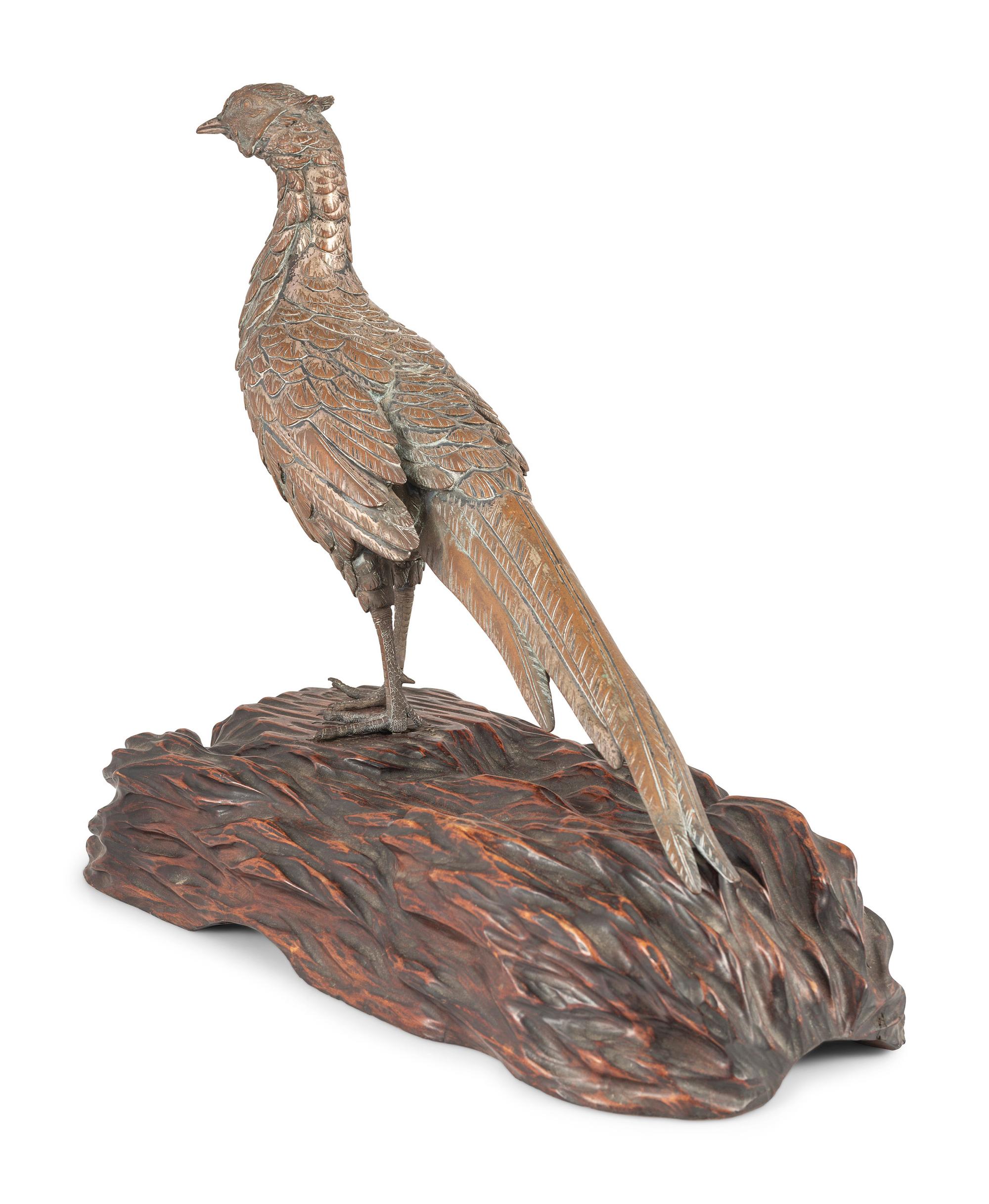A Silvered Bronze Pheasant on a Wood Stand