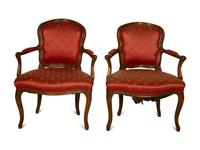 A Pair of Louis XV Beechwood Fauteuils