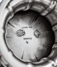 A Danish Silver Compote, Georg Jensen Silversmithy, Copenhagen, Circa 1925, the tapered circular bowl with a knopped rim and raised on