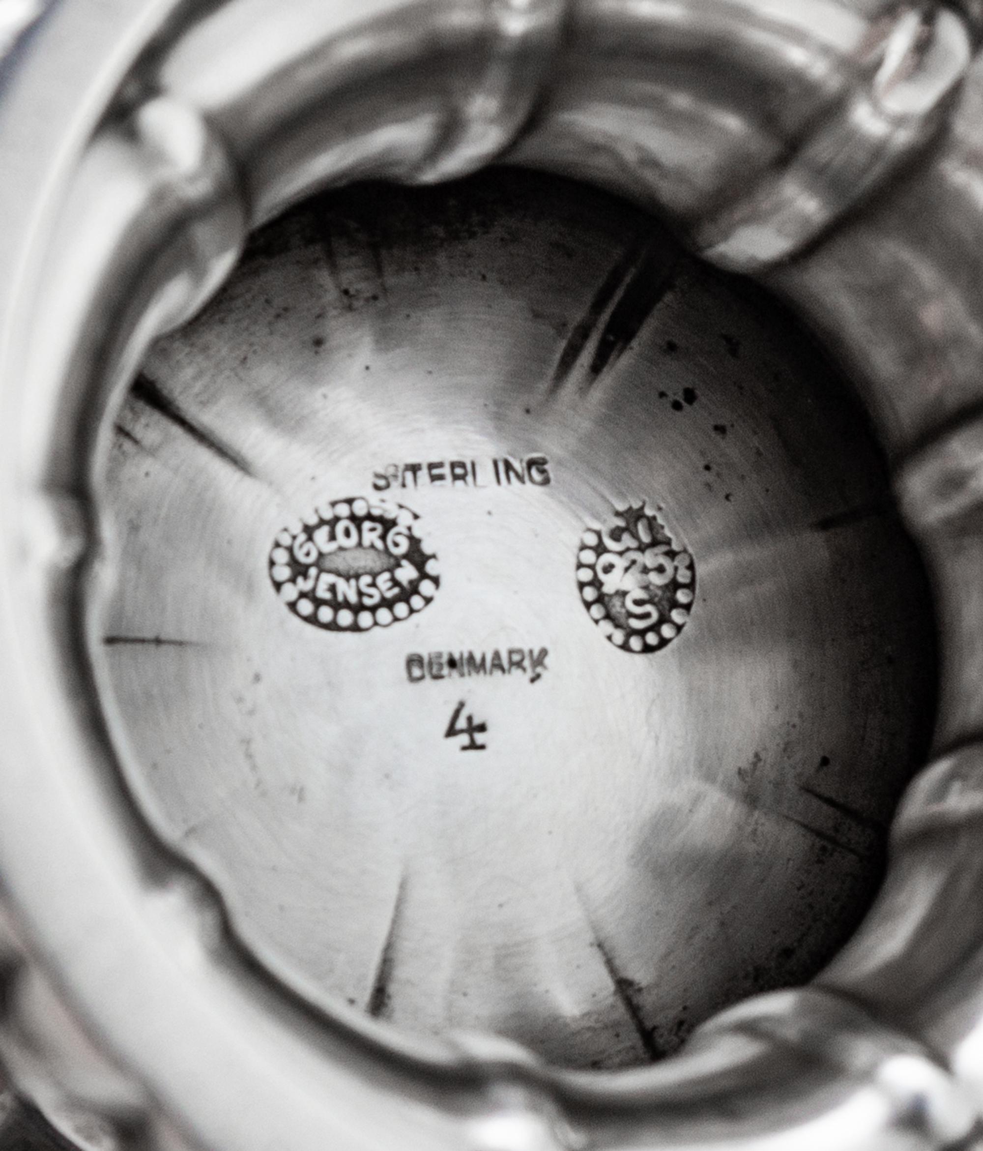 A Danish Silver Compote, Georg Jensen Silversmithy, Copenhagen, Circa 1925, the tapered circular bowl with a knopped rim and raised on
