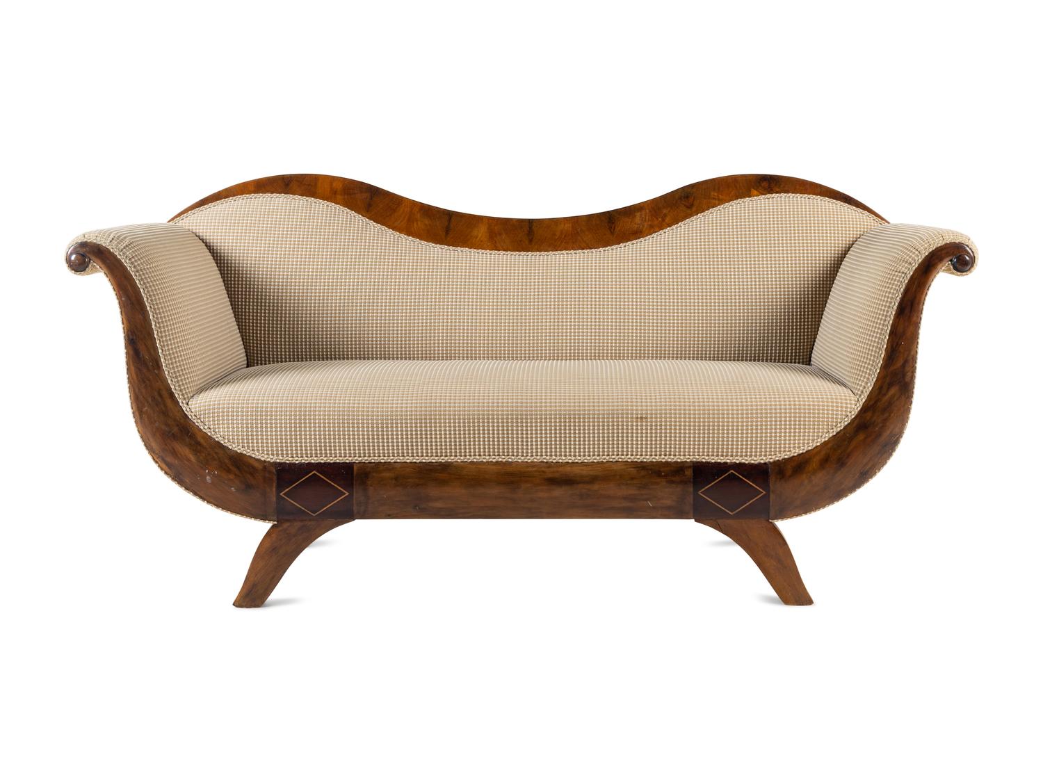 A Biedermeier Figured Walnut Sofa