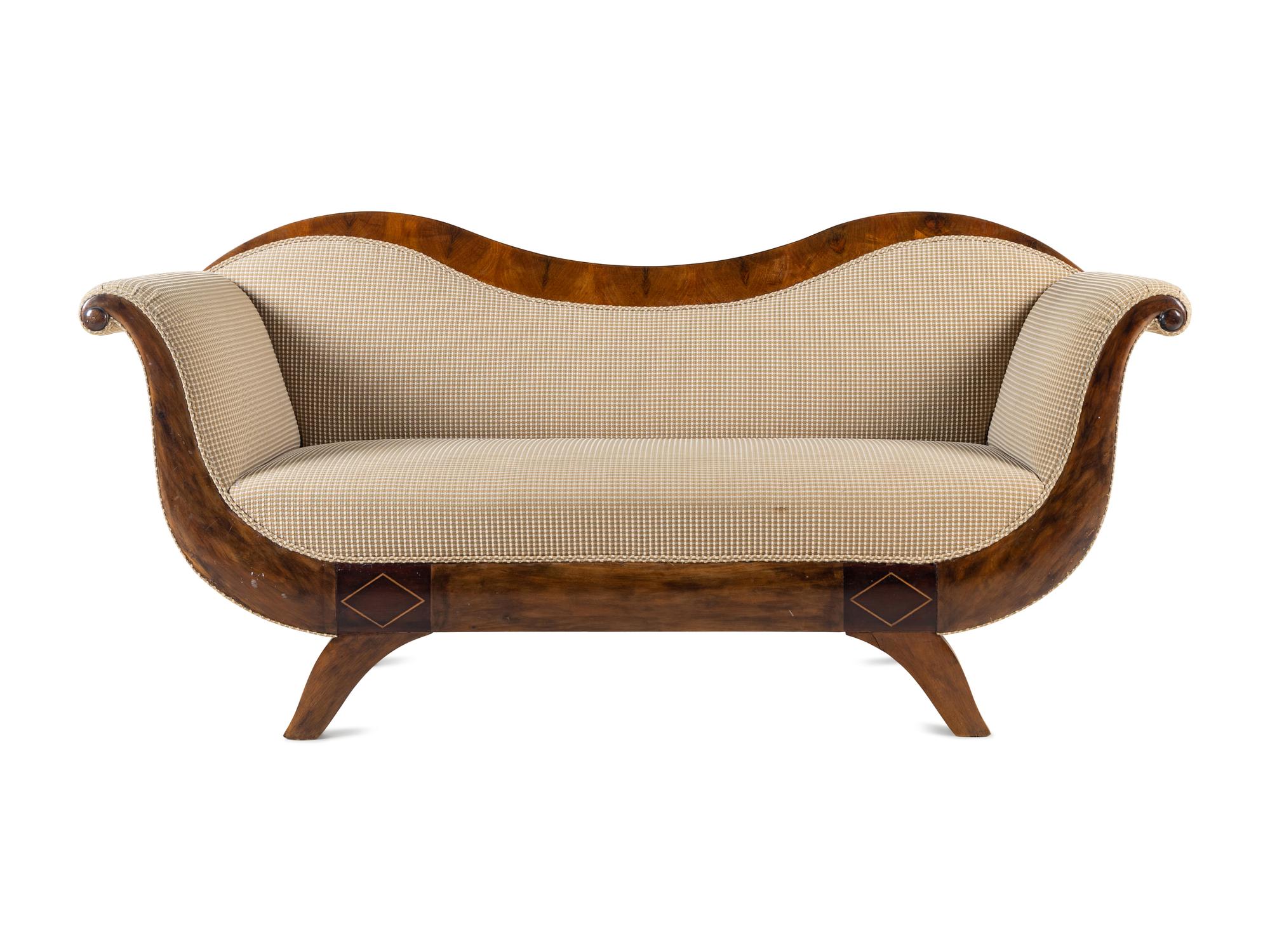 A Biedermeier Figured Walnut Sofa
