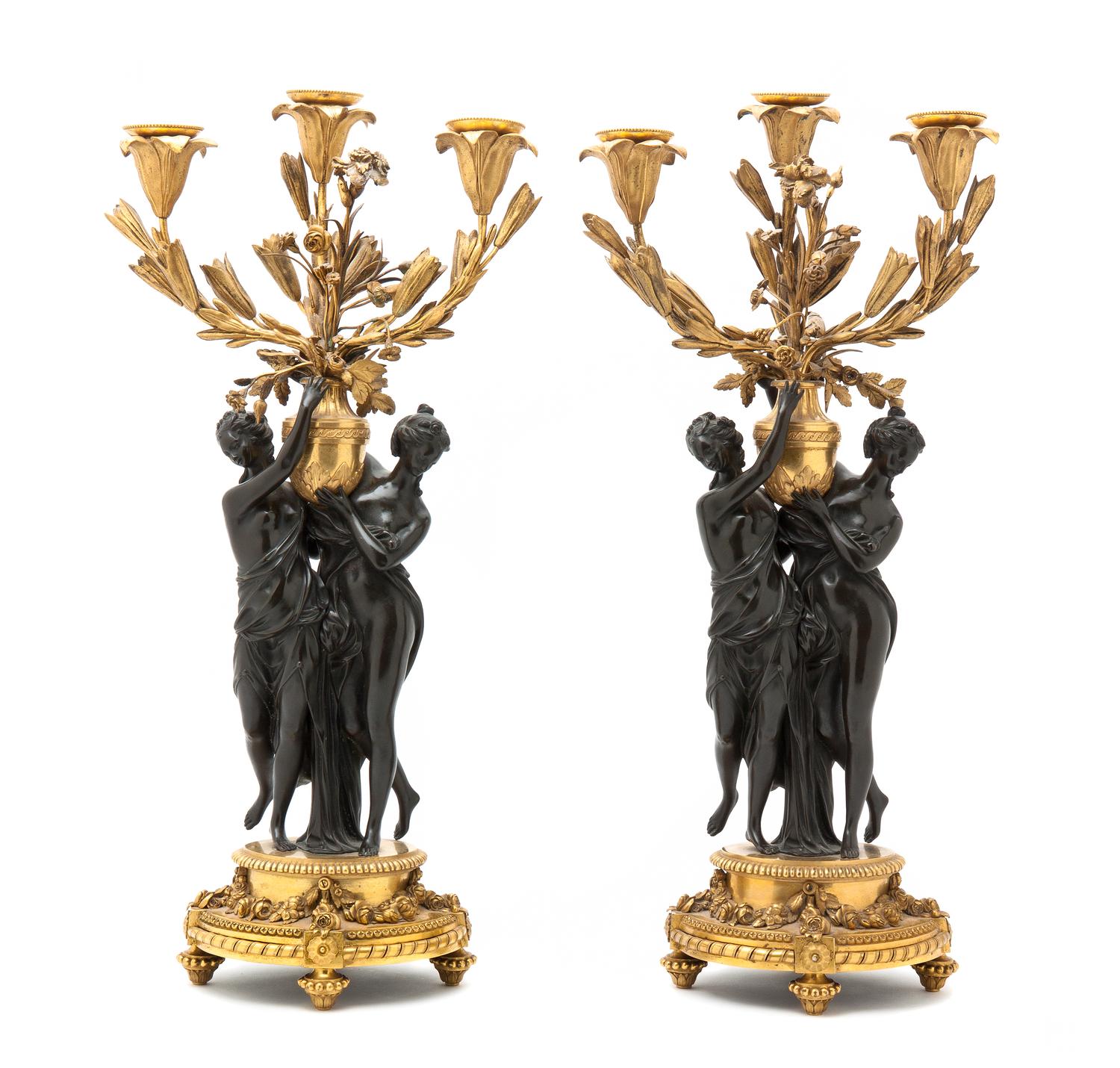 A Pair of French Gilt Bronze Three-Light Figural Candelabra, Height 23 1/2 inches.