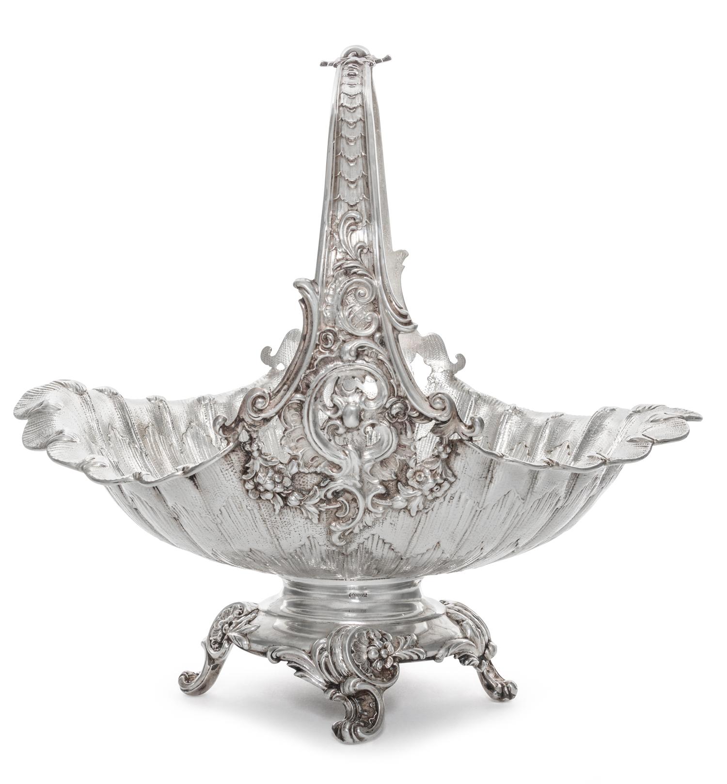 A German Silver Basket, Early 20th Cenury, of oval, handled form with scrolling foliate decoration.