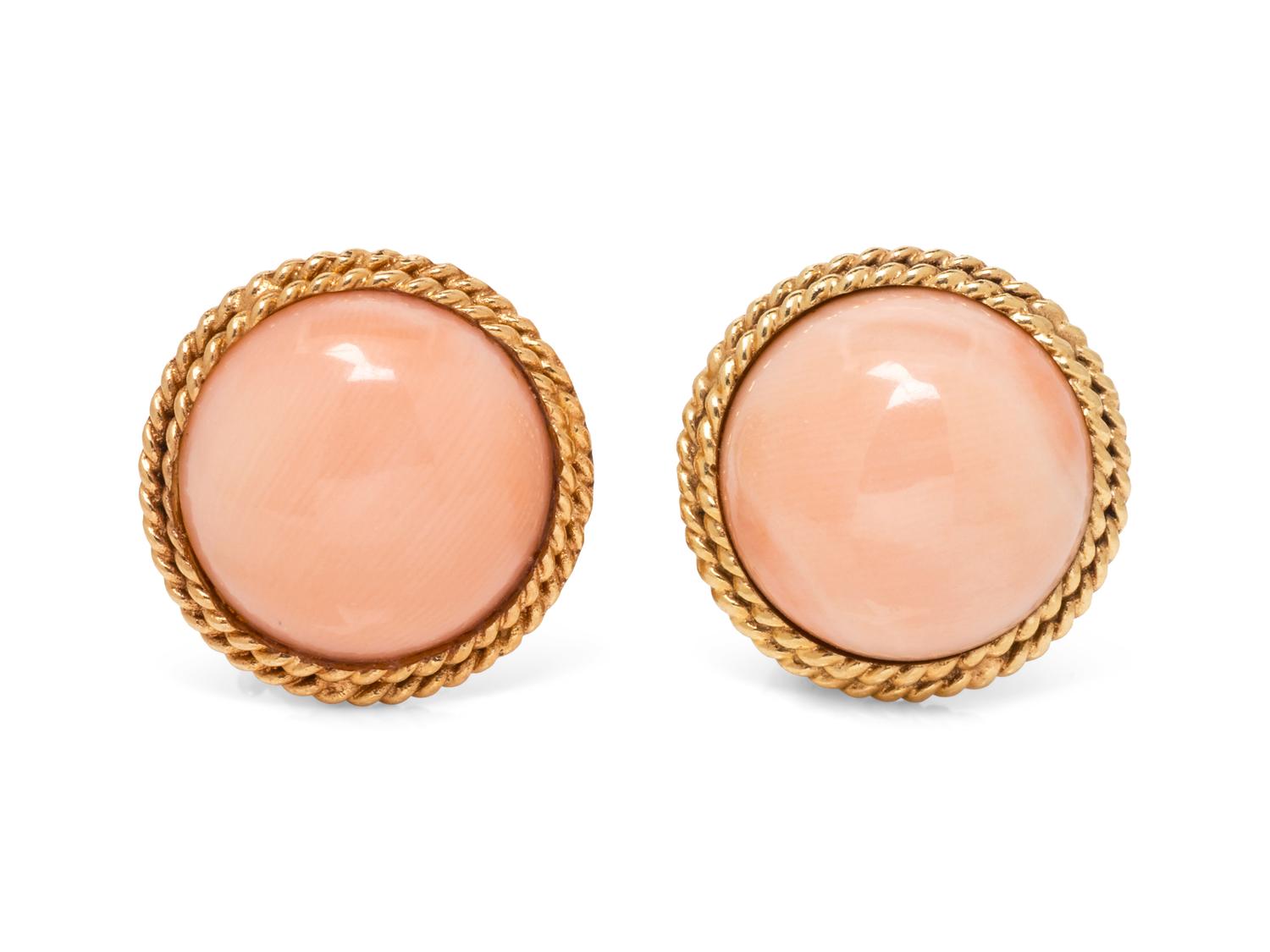 A Pair of 14 Karat Yellow Gold and Coral Earclips,