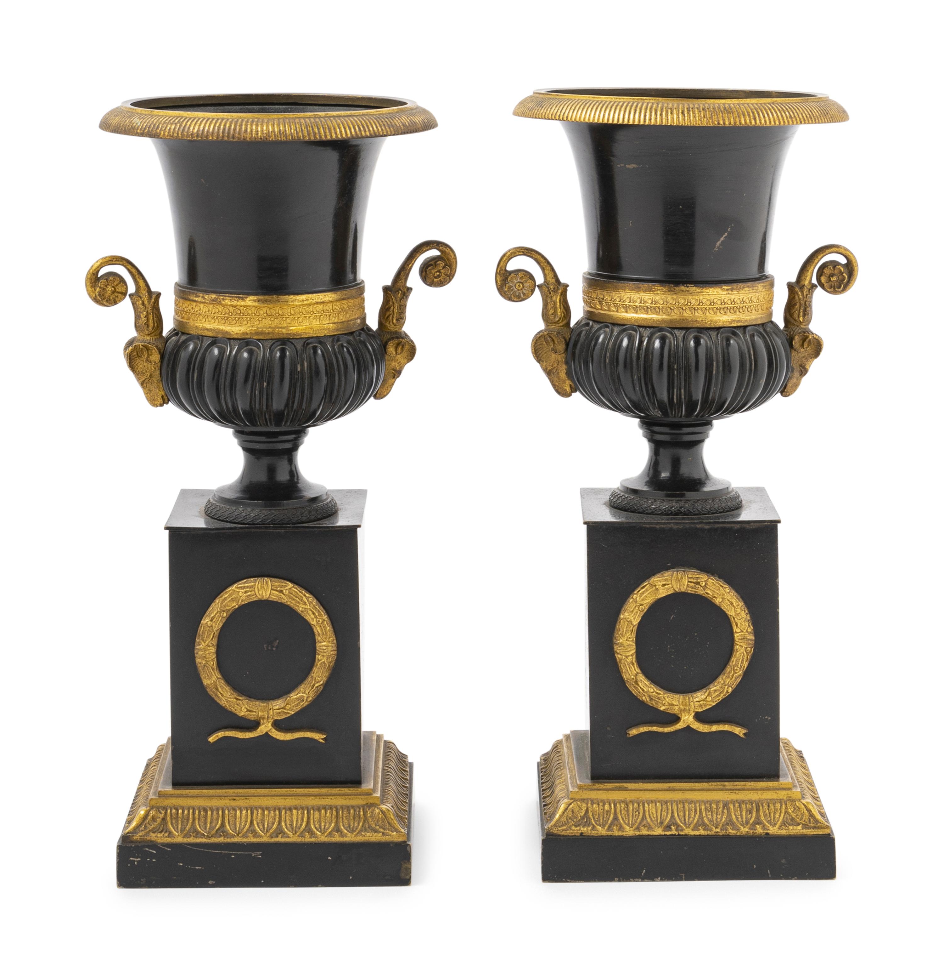 A Pair of Empire Style Gilt and Patinated Bronze Campagna Urns