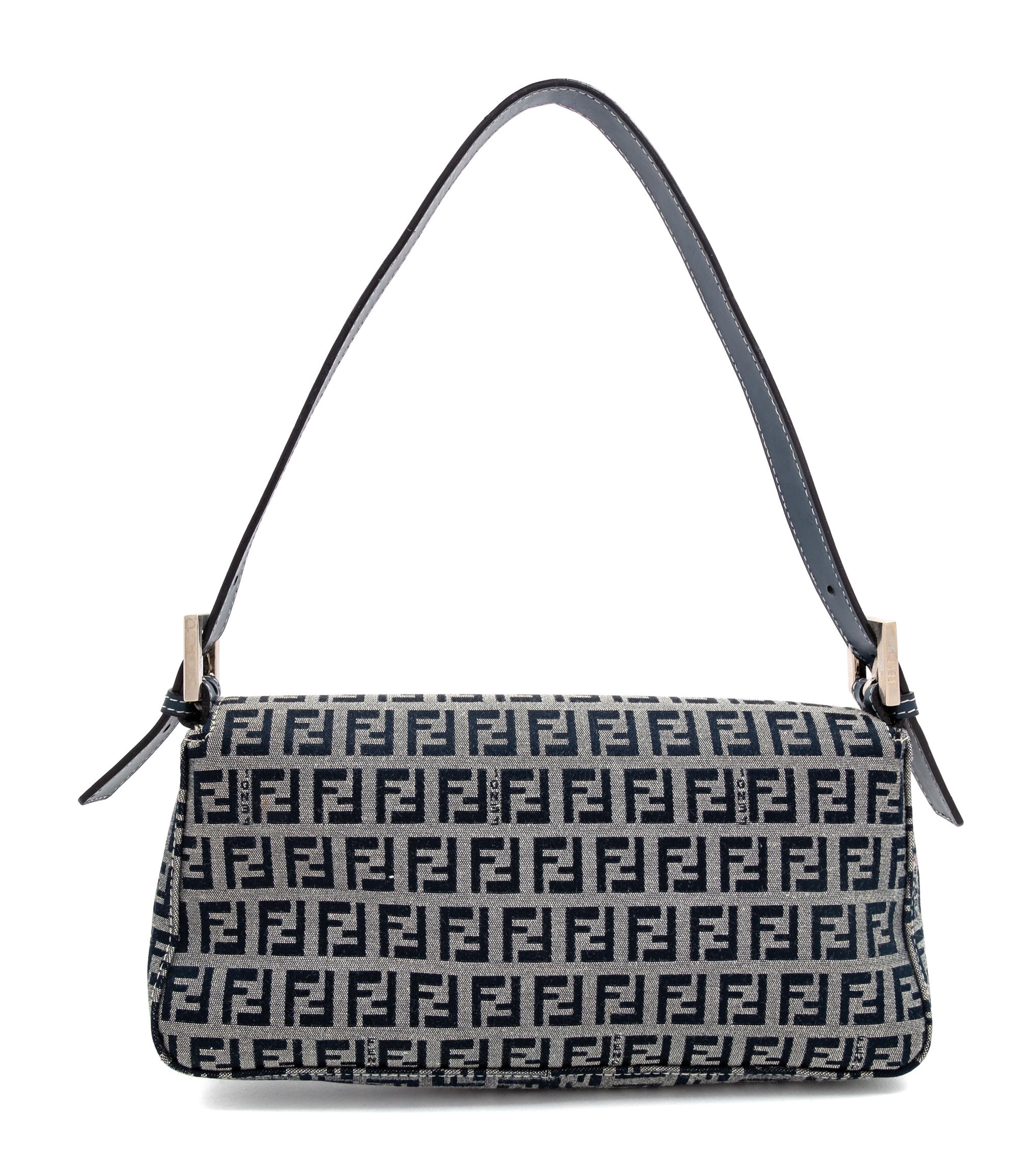 A Fendi Navy Monogram Canvas Zucca Baguette, 5" H x 10.25" W x 1.75" D; Strap drop: 6.5"- 9.5".