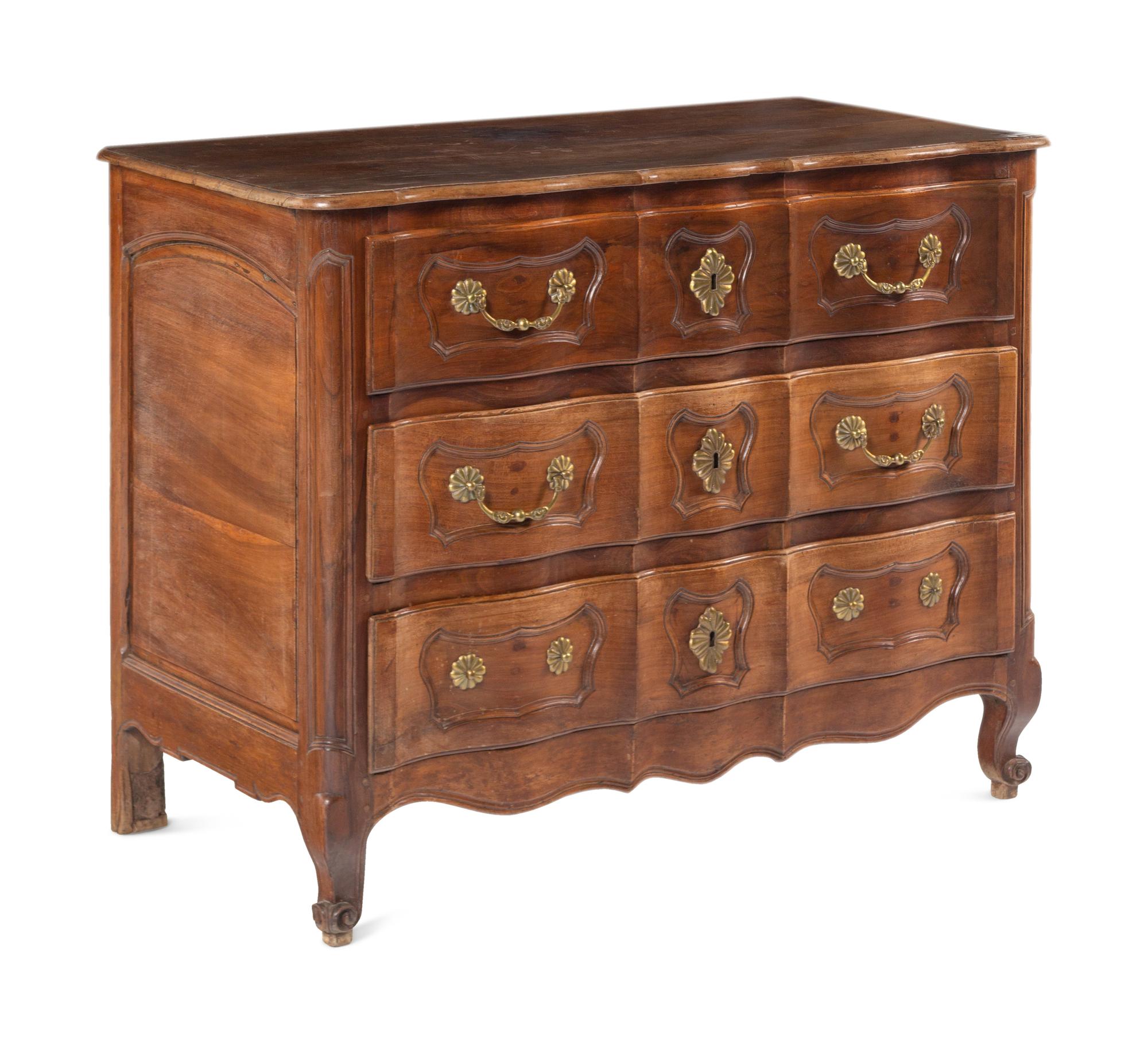 A French Provincial Walnut Serpentine-Front Chest of Drawers