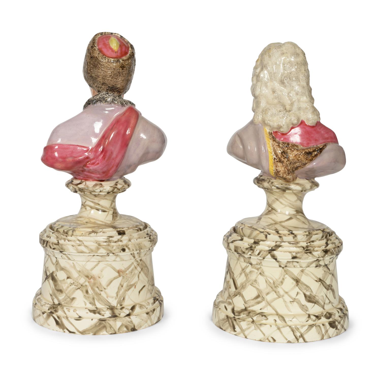 A Pair of French Faience Busts of Voltaire and Rousseau