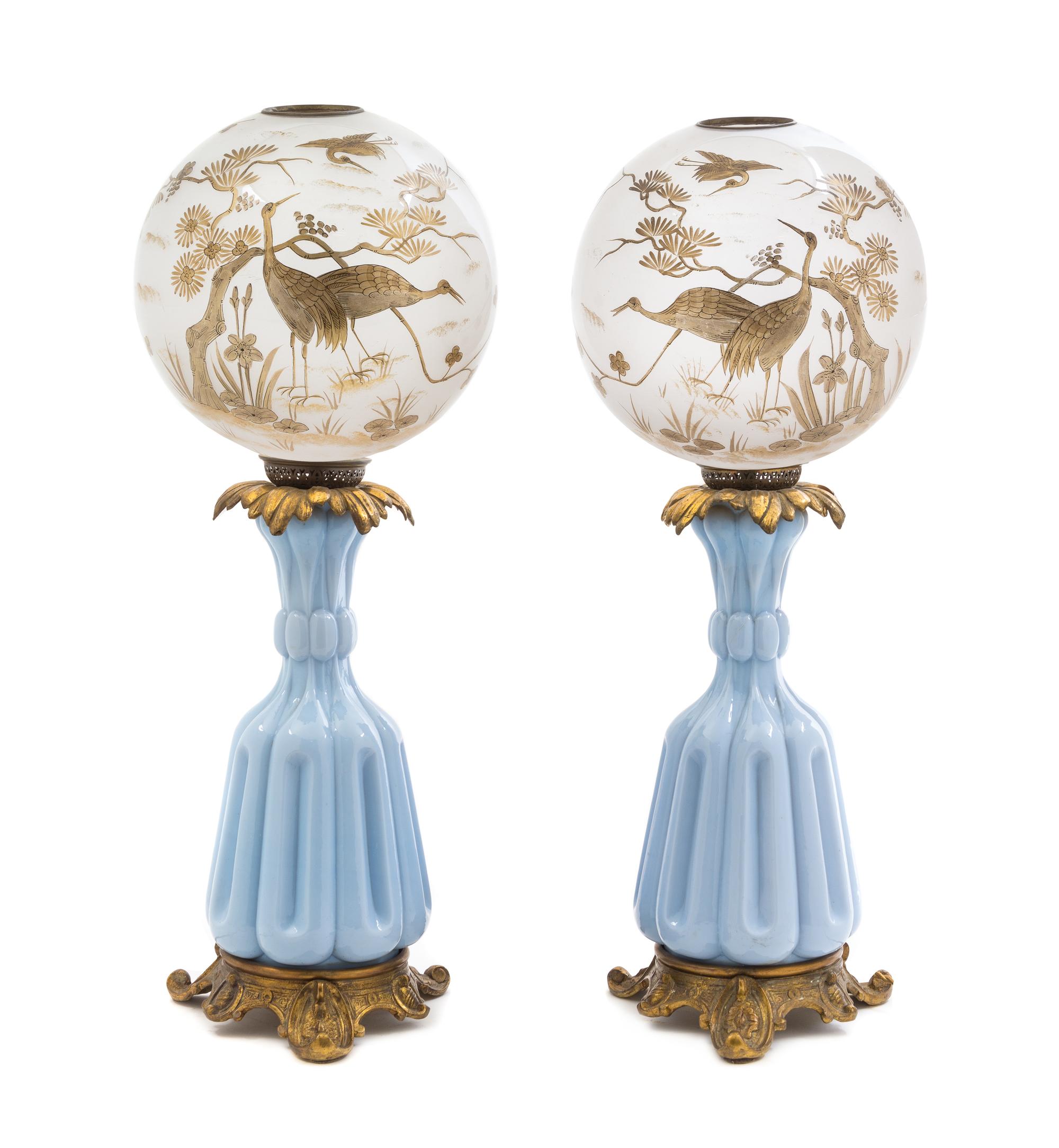 A Pair of Italian Gilt Metal Mounted Glass Fluid Lamps Height of lamp base 17 inches. — 19TH CENTURY