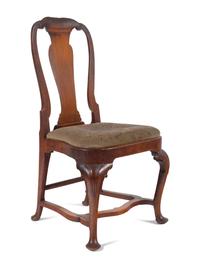 A Queen Anne Volute Carved Walnut Flat-Stretcher Pad-Foot Side Chair