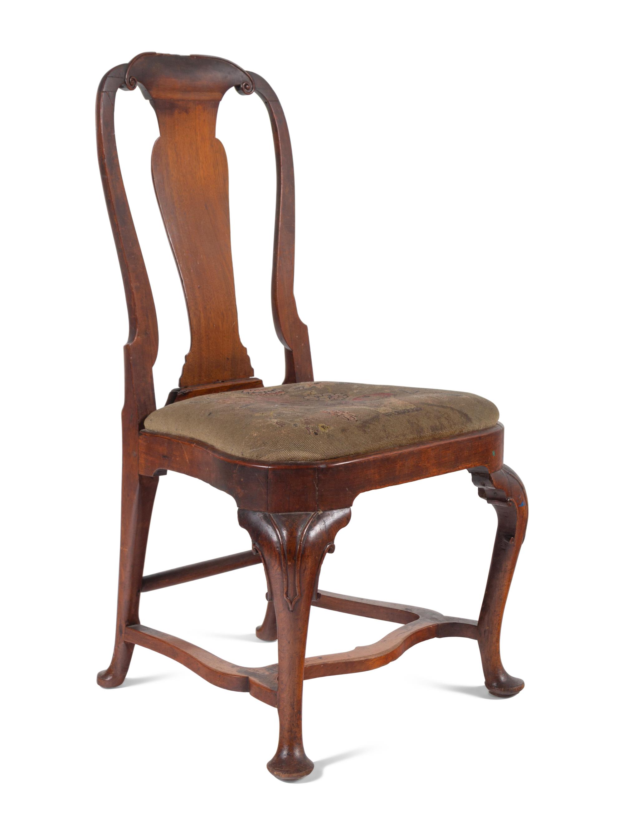 A Queen Anne Volute Carved Walnut Flat-Stretcher Pad-Foot Side Chair