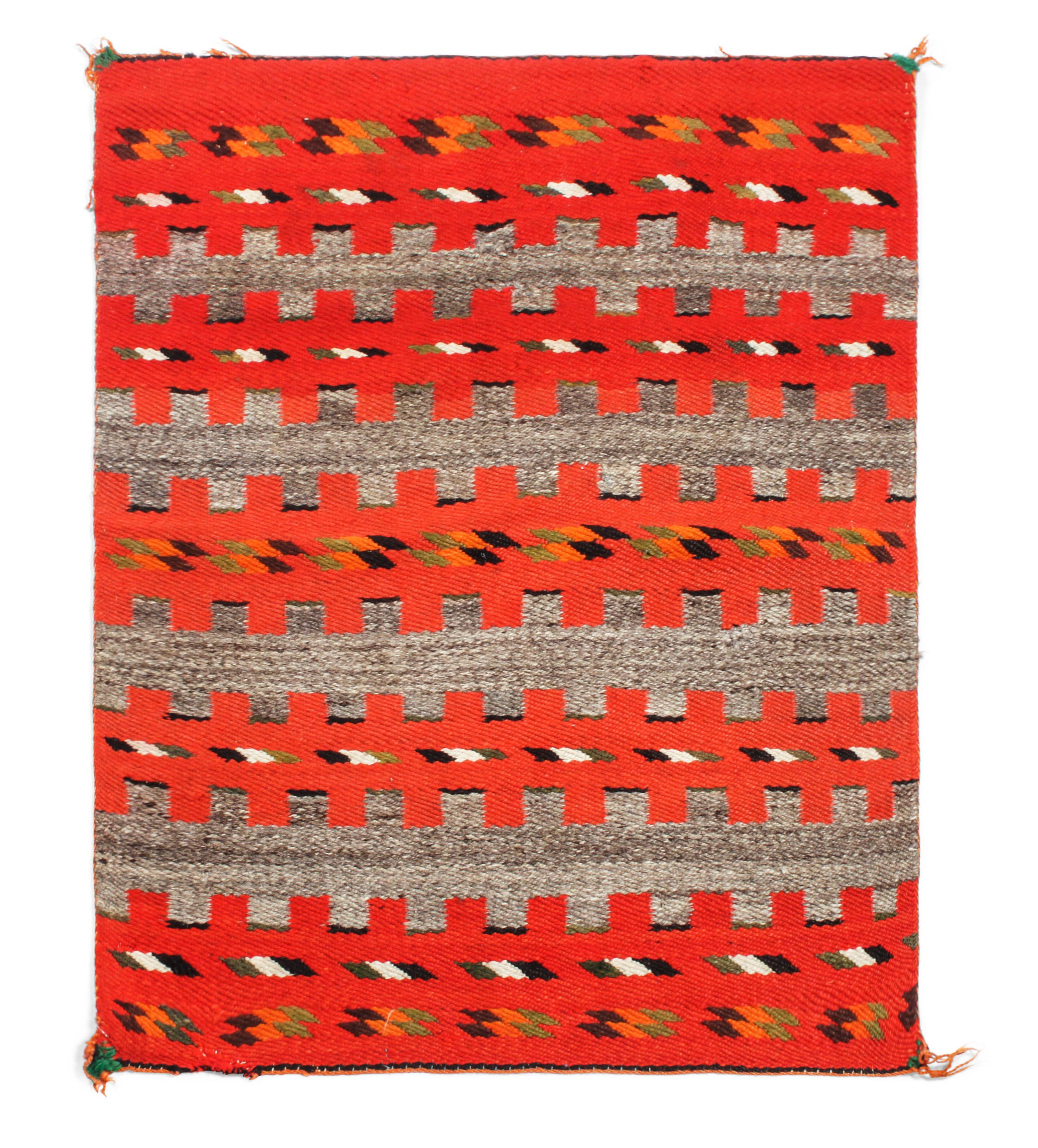 A Navajo Transitional Twill Saddle Blanket 27 x 34 inches. — LATE 19TH/ EARLY 20TH CENTURY