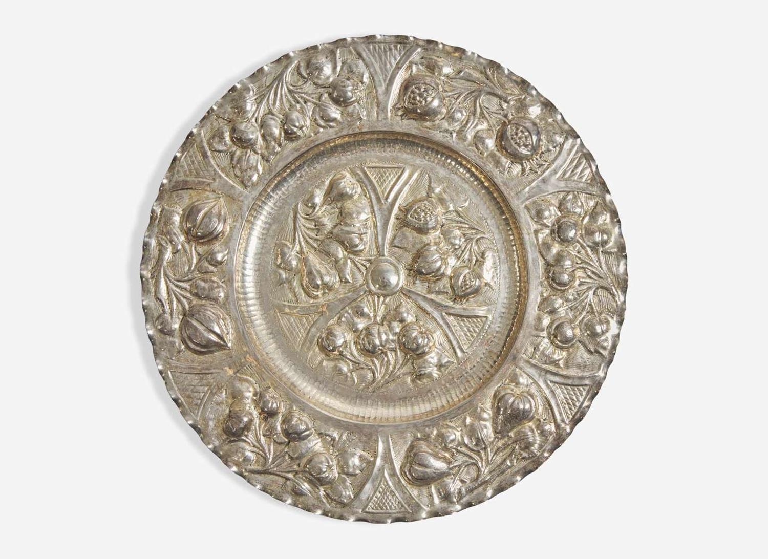A Portuguese silver repoussé charger, 19th / 20th century