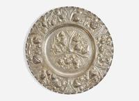A Portuguese silver repoussé charger, 19th / 20th century
