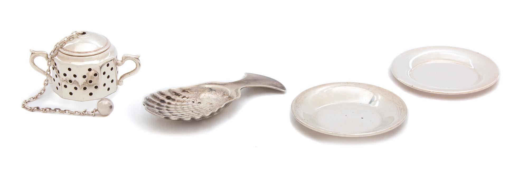 Four American Silver Pieces, Tiffany & Co., New York, NY, comprising a covered sugar-form tea basket, a small spoon with shell bowl and