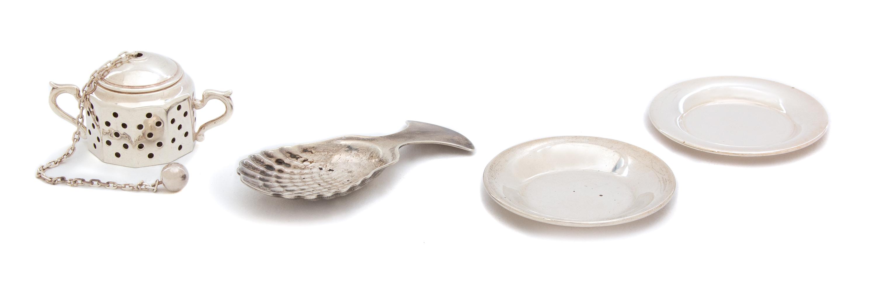 Four American Silver Pieces, Tiffany & Co., New York, NY, comprising a covered sugar-form tea basket, a small spoon with shell bowl and