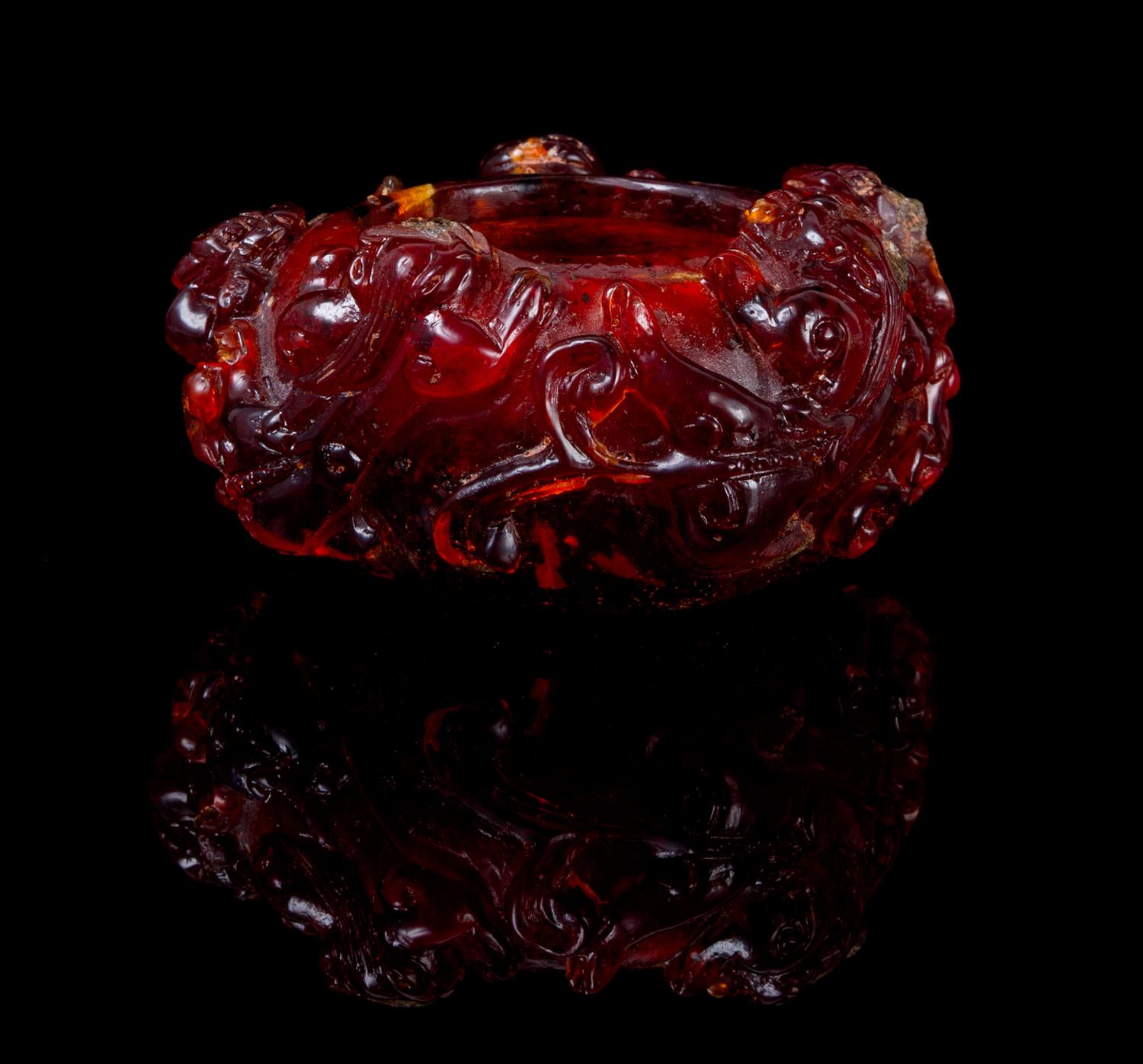 A Carved Amber Brush Washer Width 3 1/2 inches.