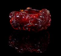 A Carved Amber Brush Washer Width 3 1/2 inches.