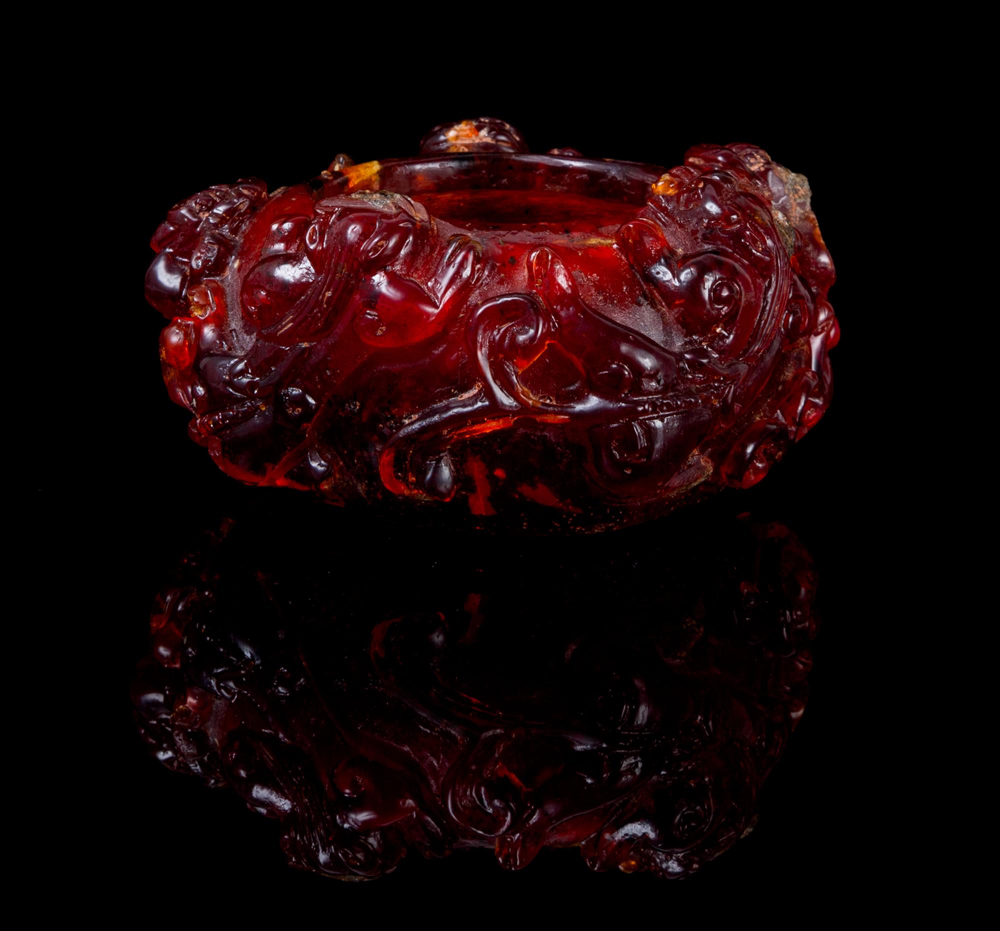 A Carved Amber Brush Washer Width 3 1/2 inches.