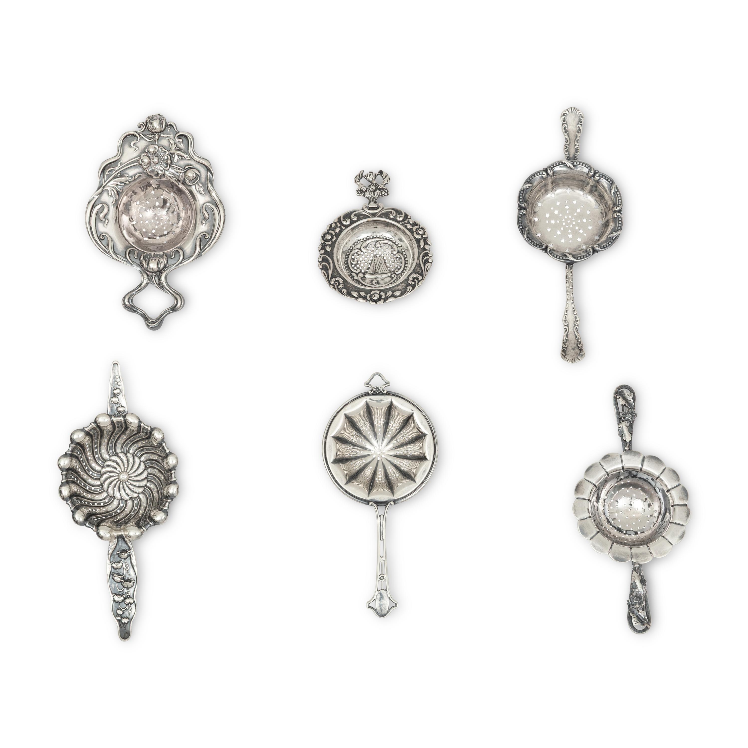 A Collection of Twenty Silver Tea Strainers