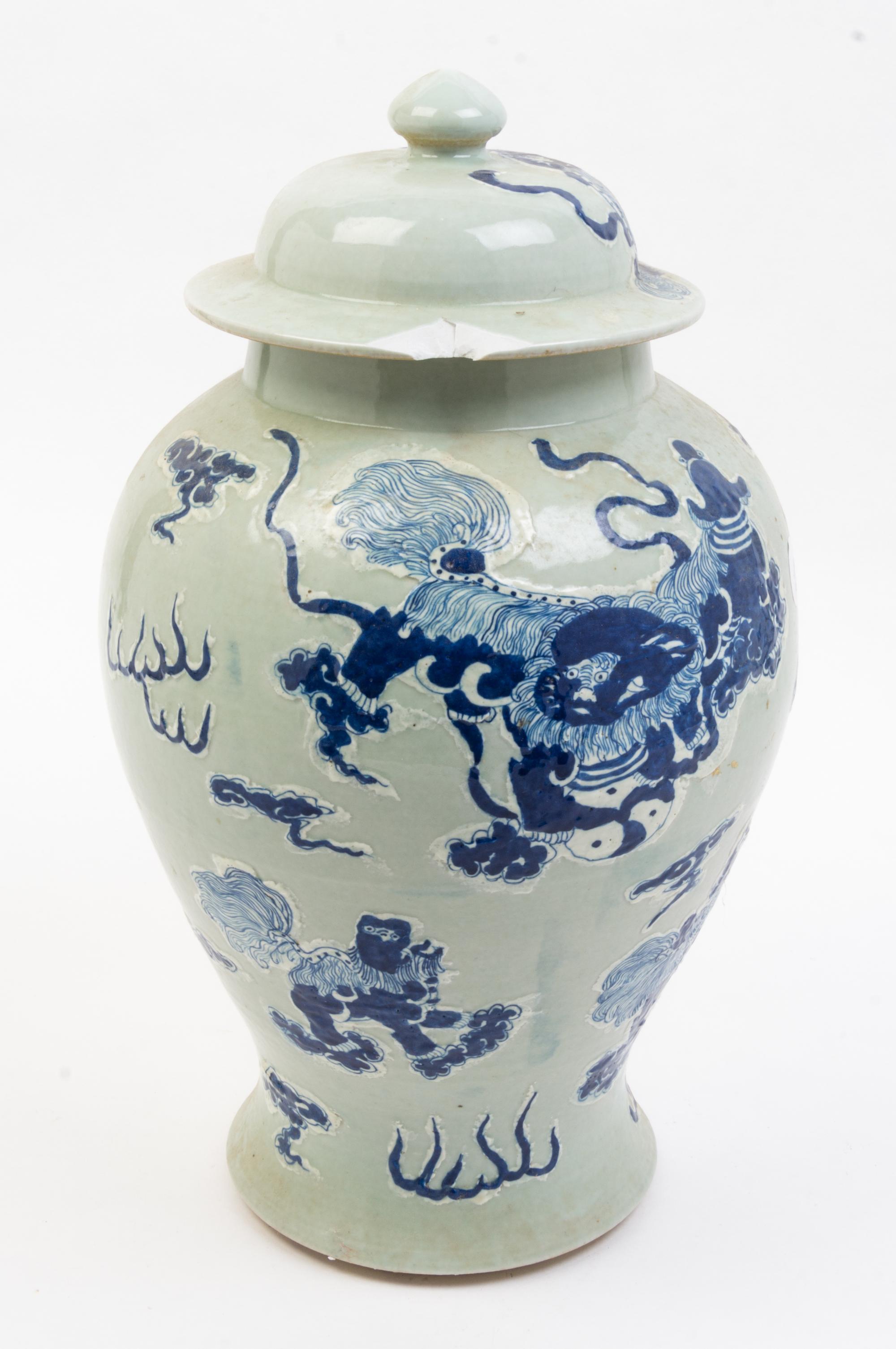A Pair of Blue and White Porcelain Jars and Covers Height 17 1/2 inches.