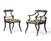 A set of eight Neoclassical gilt-bronze mounted ebonized dining chairs, possibly Baltic Region, circa 1820