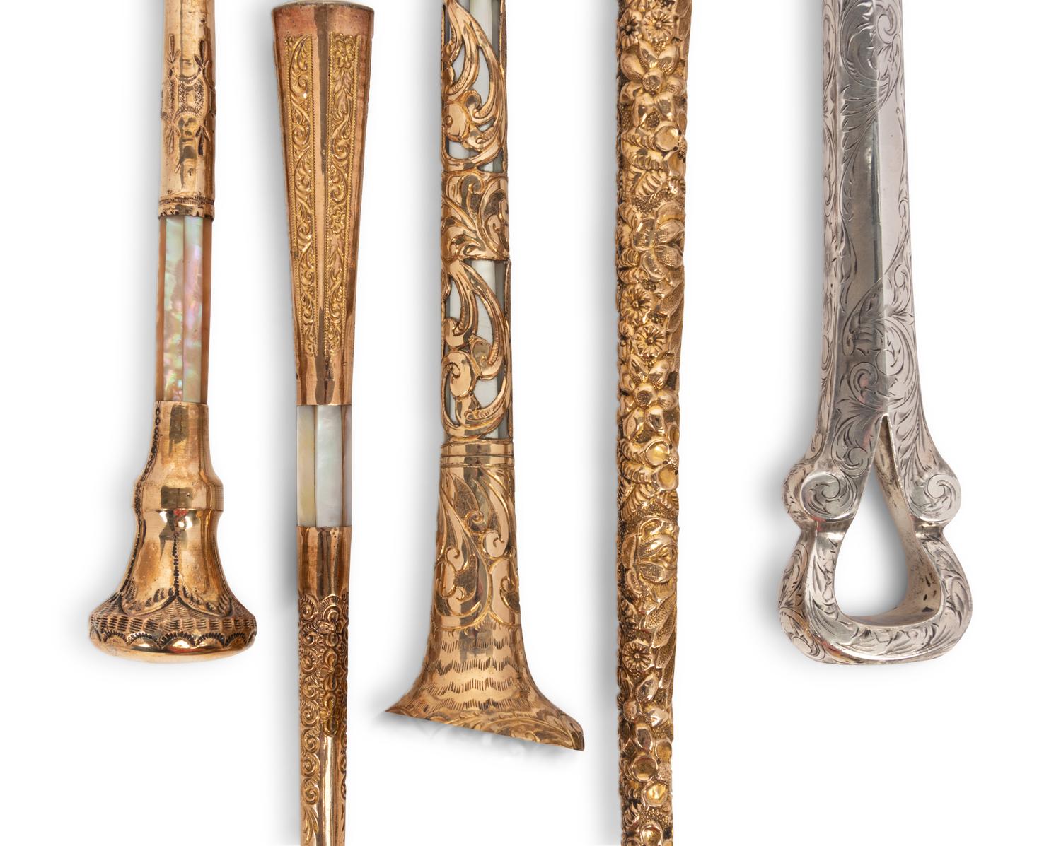 A Group of Five Victorian Parasol Handles Converted to Magnifying Glasses