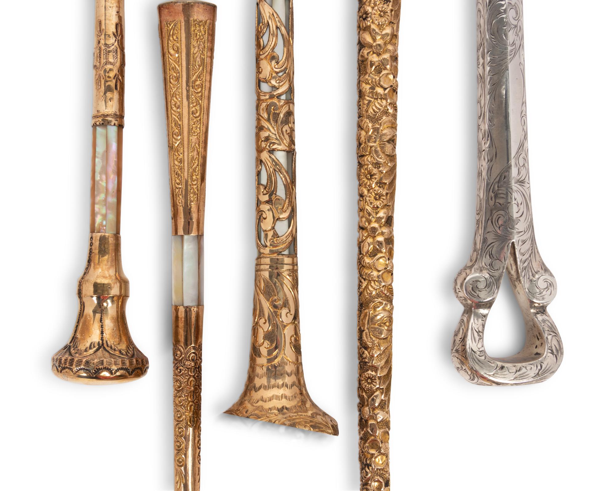 A Group of Five Victorian Parasol Handles Converted to Magnifying Glasses