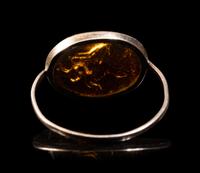 A Roman Silver and Glass Finger Ring of a Satyr Kissing a Goat