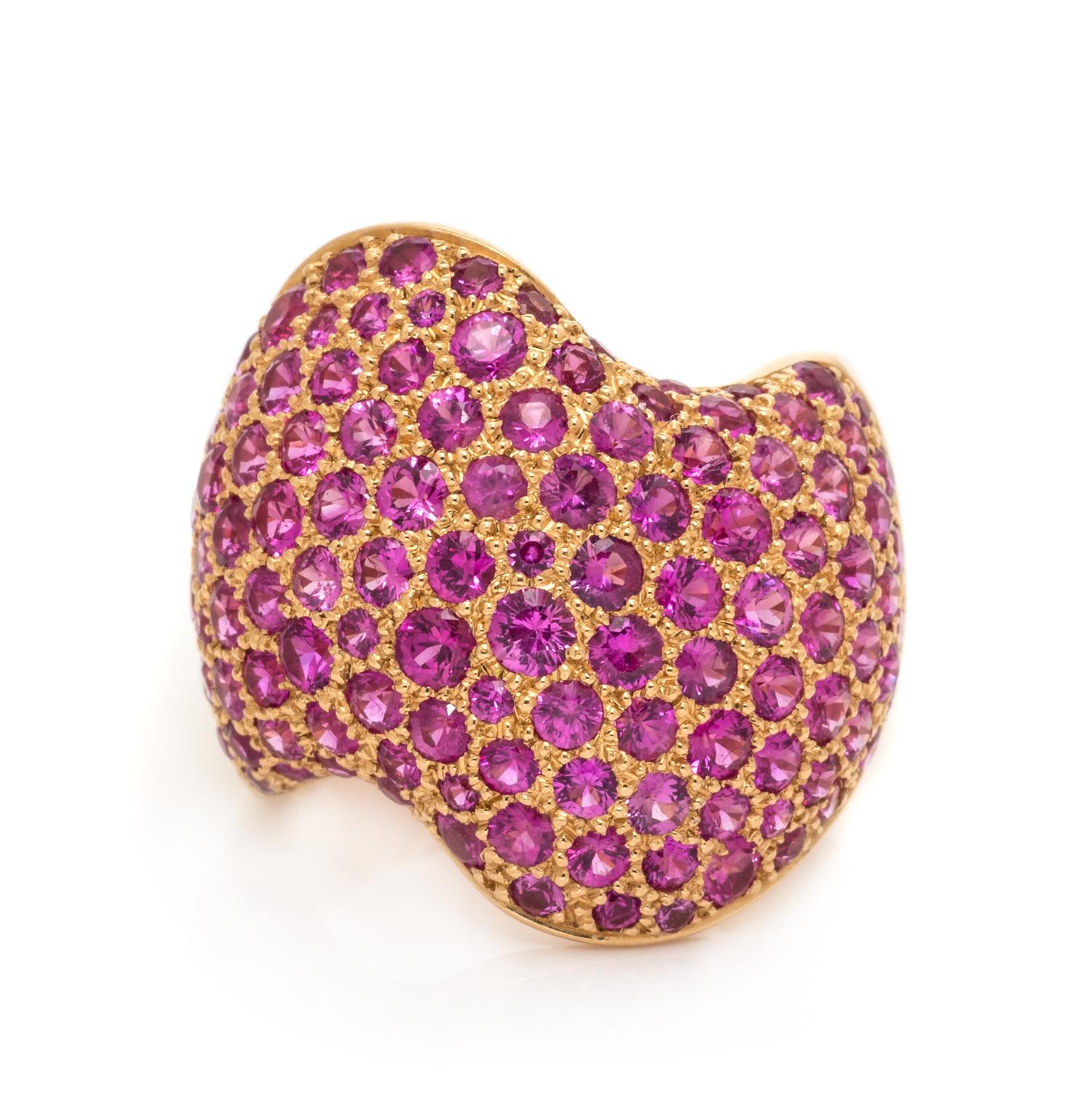 An 18 Karat Rose Gold and Pink Sapphire Wave Motif Ring, Van Cleef & Arpels, 9.30 dwts.