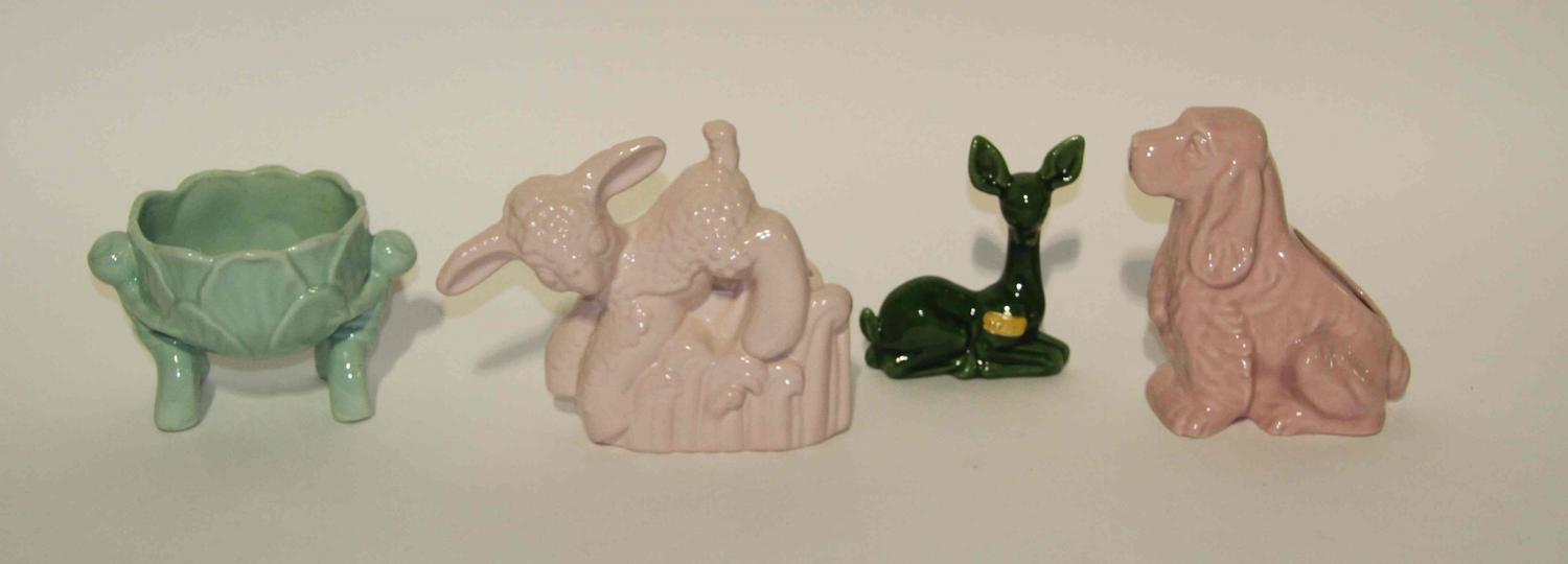 A Collection of Fifteen Haeger Pottery Animal Figures Width of largest 14 inches.