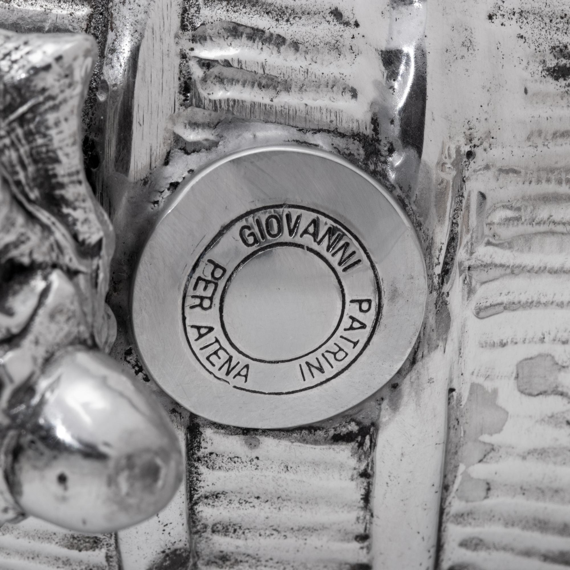 A Collection of Silvered Shells and Shell-Form Table Ornaments