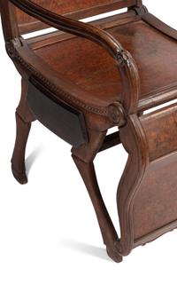 A Pair of Portuguese Colonial Carved Walnut Reclining Armchairs