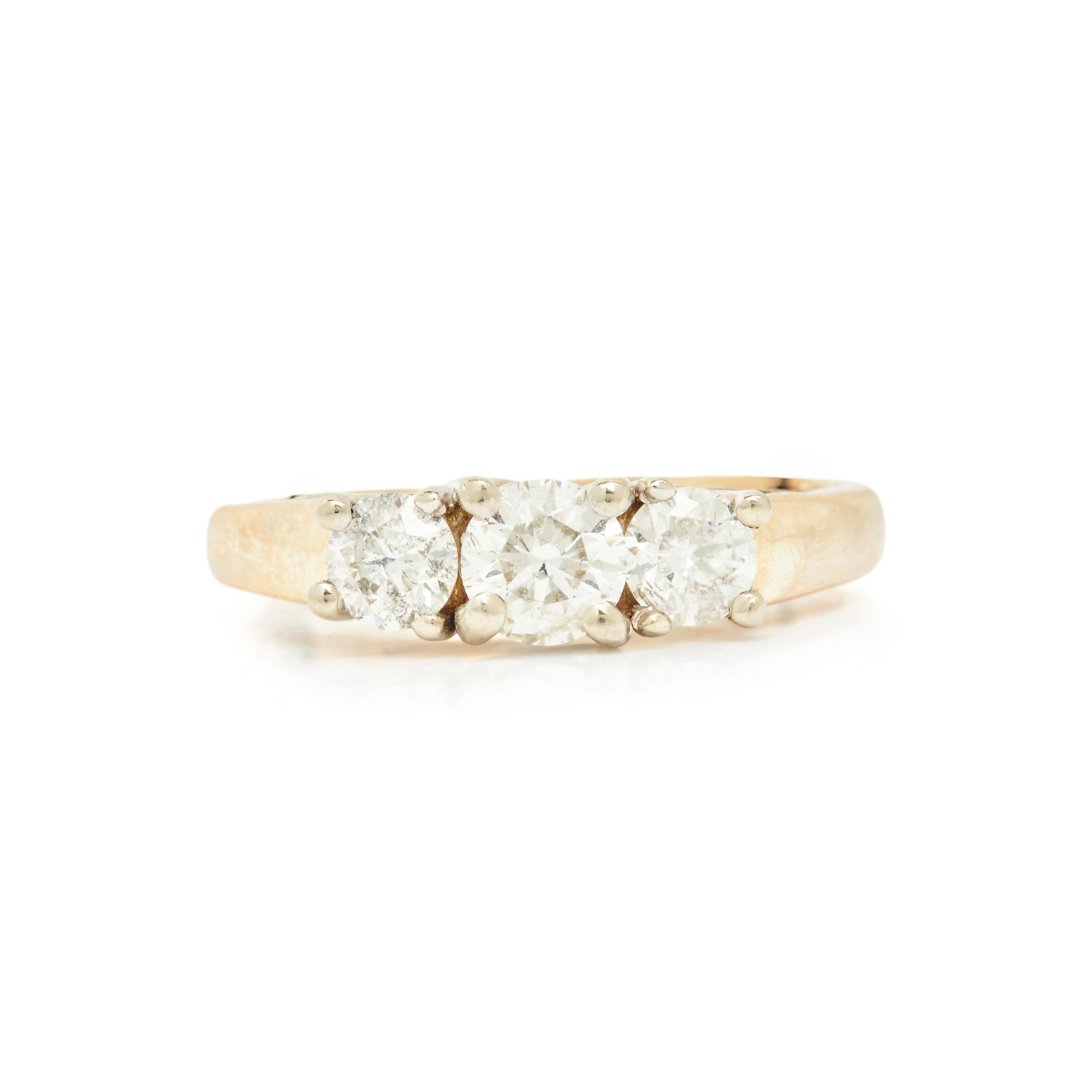 YELLOW GOLD AND DIAMOND THREE STONE RING