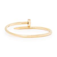 CARTIER, YELLOW GOLD 'JUSTE UN CLOU' BANGLE BRACELET