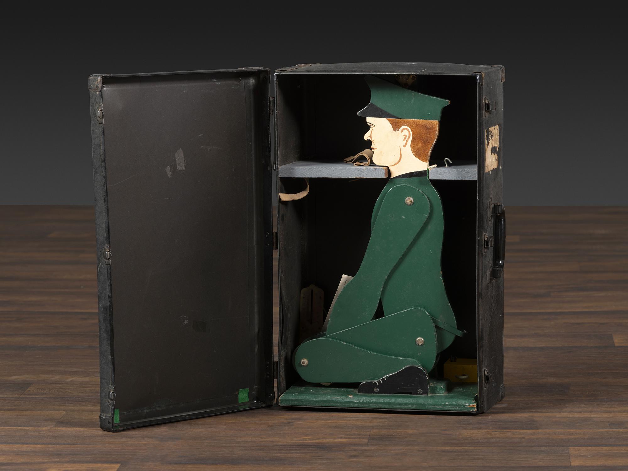 A Carved and Painted Wood Figural Post Office Scale