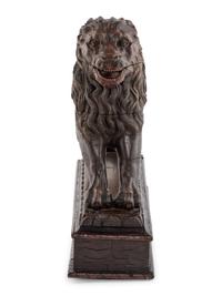 A Continental Carved Oak Lion