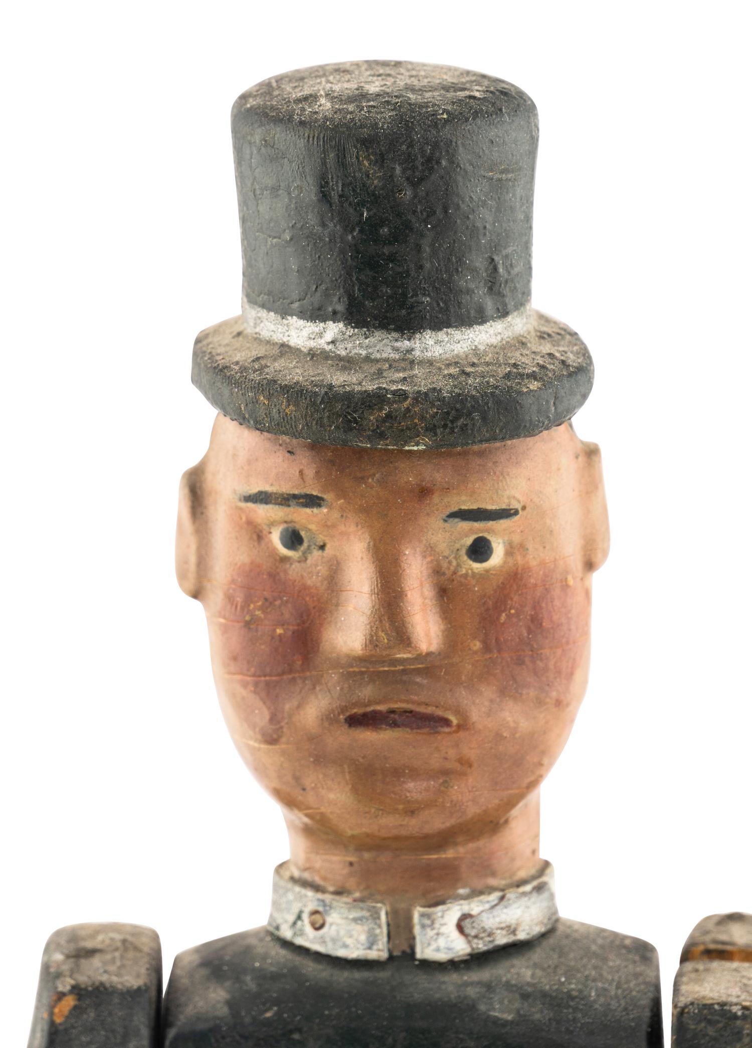 A Carved and Painted Wood Figural Whirlgig