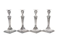 A Set of Four Silver-Plate Candlesticks