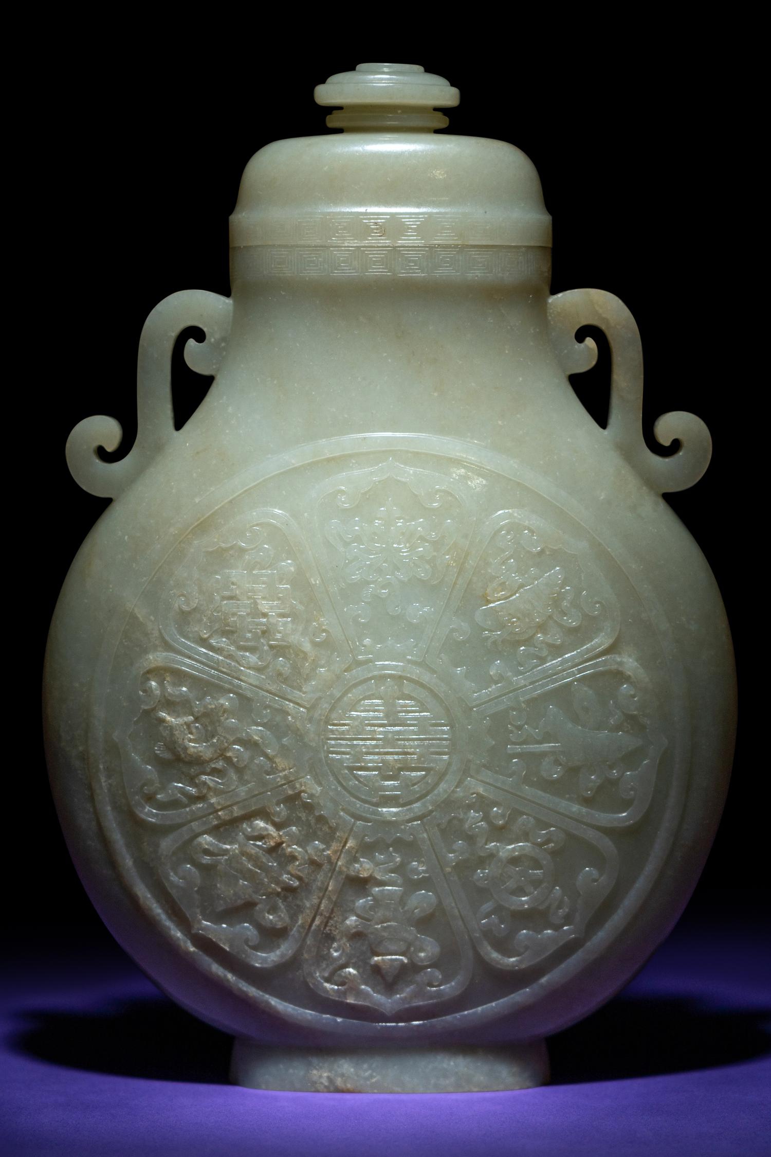 A Rare and Finely Carved Chinese White Jade Covered Vase
