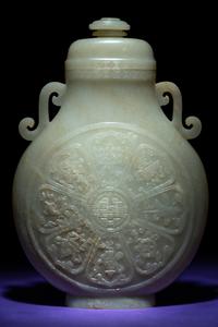 A Rare and Finely Carved Chinese White Jade Covered Vase